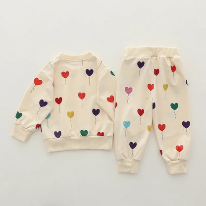 Off White Multi Hearts Printed Sweatshirt & Printed Trouser For Kids ( CN-KTS-014 )